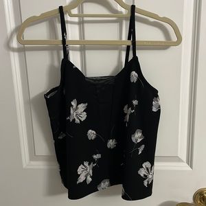 Black and grey/white floral tank with mesh v neck detail in front size M